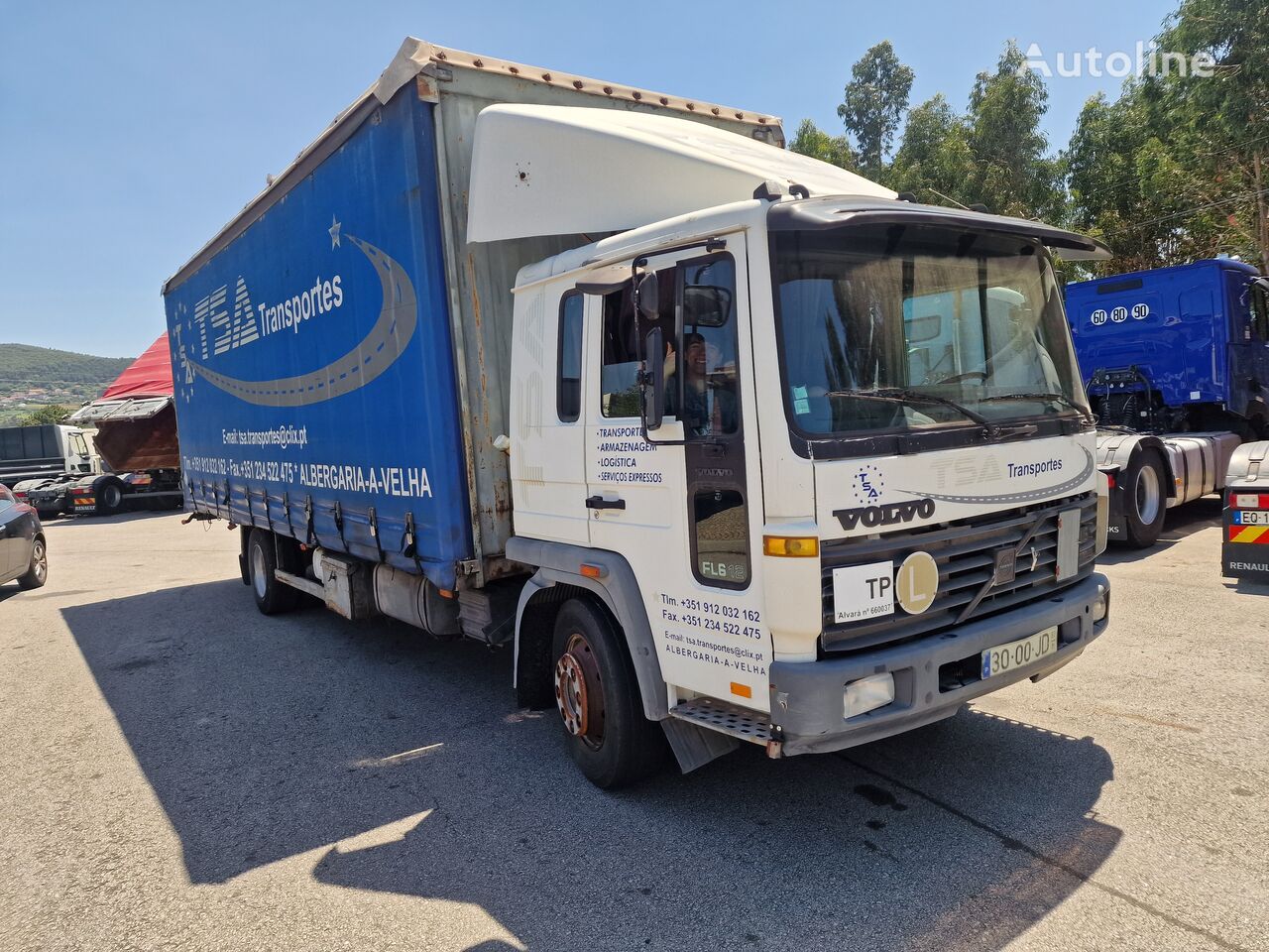 Volvo FL 612 camión con lona corredera